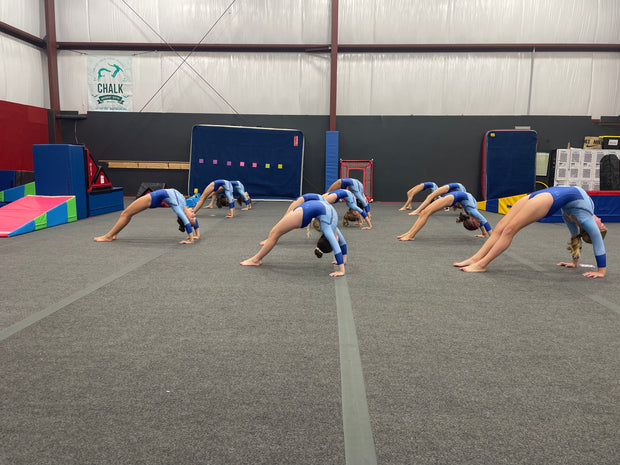 <a href="/pages/class-landing" title="Explore a World of Classes at Chalk School of Movement"><em><strong>CLASSES</strong></em></a>