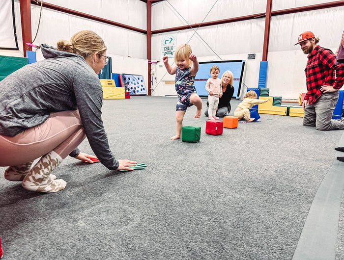 Our Pre-K Gymnastics program provides a delightful opportunity for your little ones to have fun and release their boundless energy while learning through movement. At CSOM, our Pre-K Coaches focus on teaching coordination, balance, flexibility, and strength, all of which build strong foundations for overall development and future athletes.